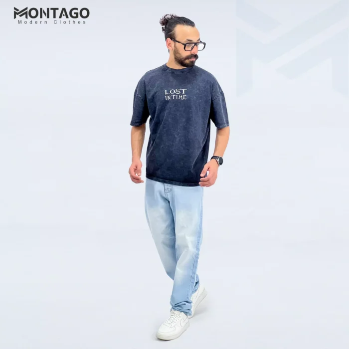a man wearing glasses and a t-shirt